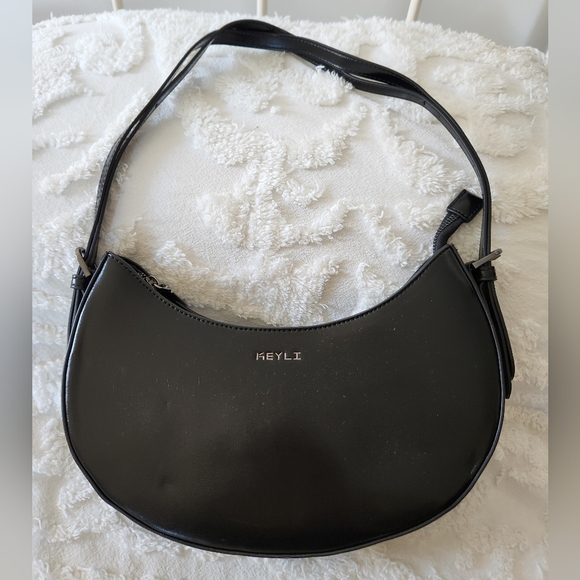 Keyli Handbags - NWT Keyli Black Paten Leather Look Bag.  Beautiful hugging shape and style.